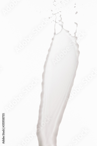 pure fresh white milk splash isolated on white