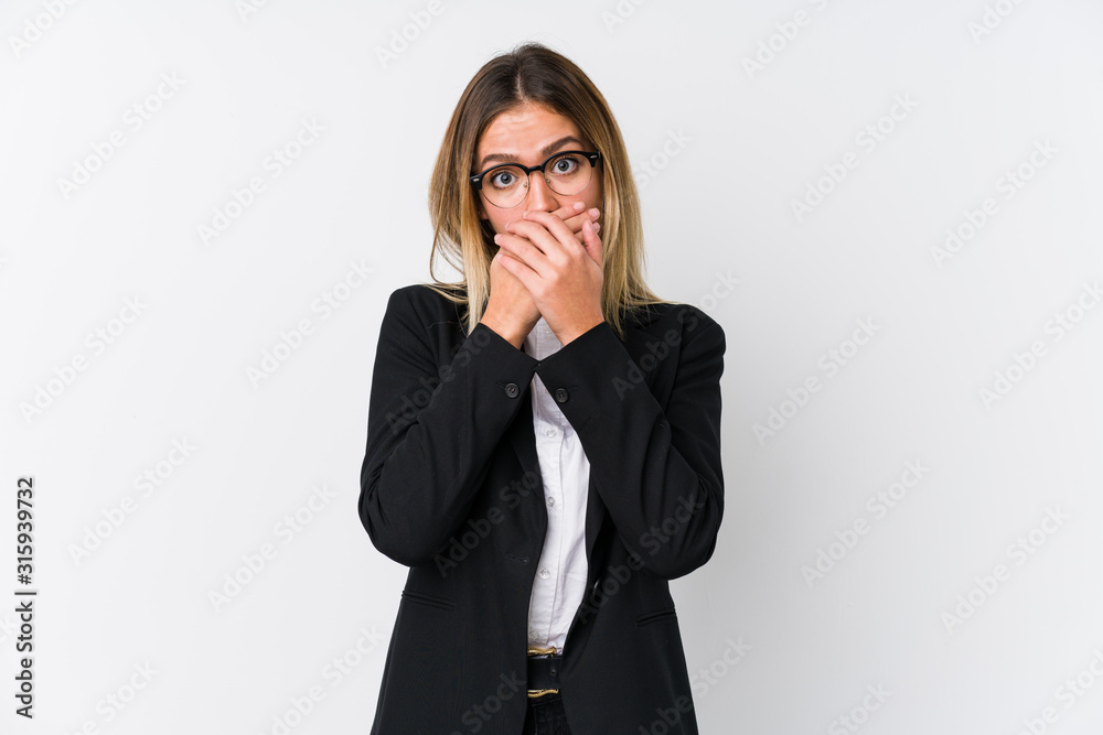 Young business caucasian woman shocked covering mouth with hands. Young business caucasian woman shocked covering mouth with hands.