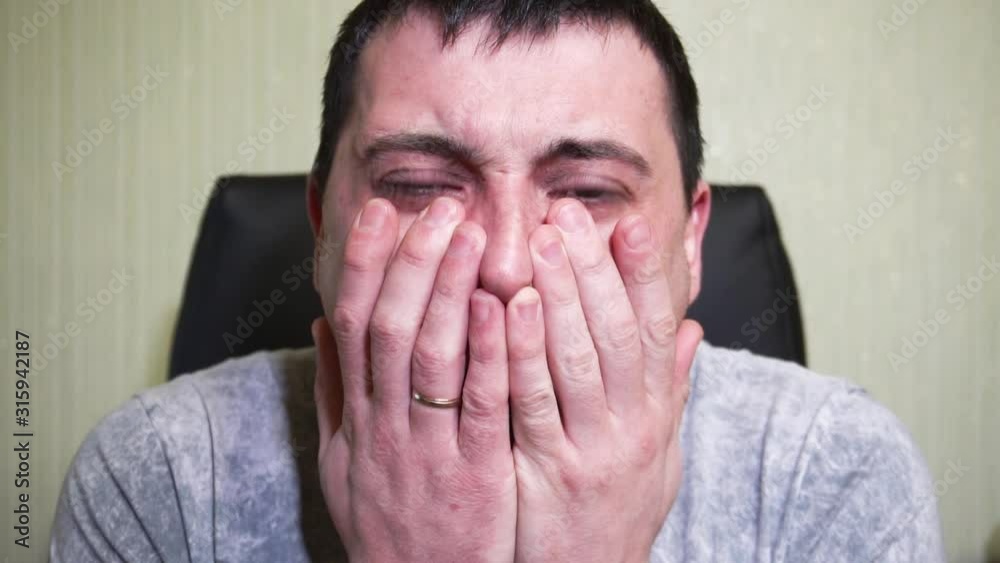 The man is scared in shock. Vivid emotion of fear in a man The man is scared in shock. Vivid emotion of fear in a man