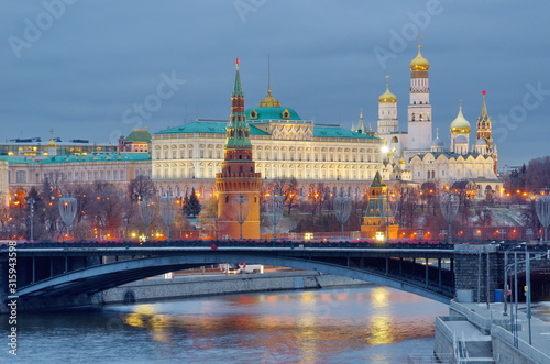 View of the Moscow Kremlin and the Big Stone bridge on a winter evening. Moscow, Russia