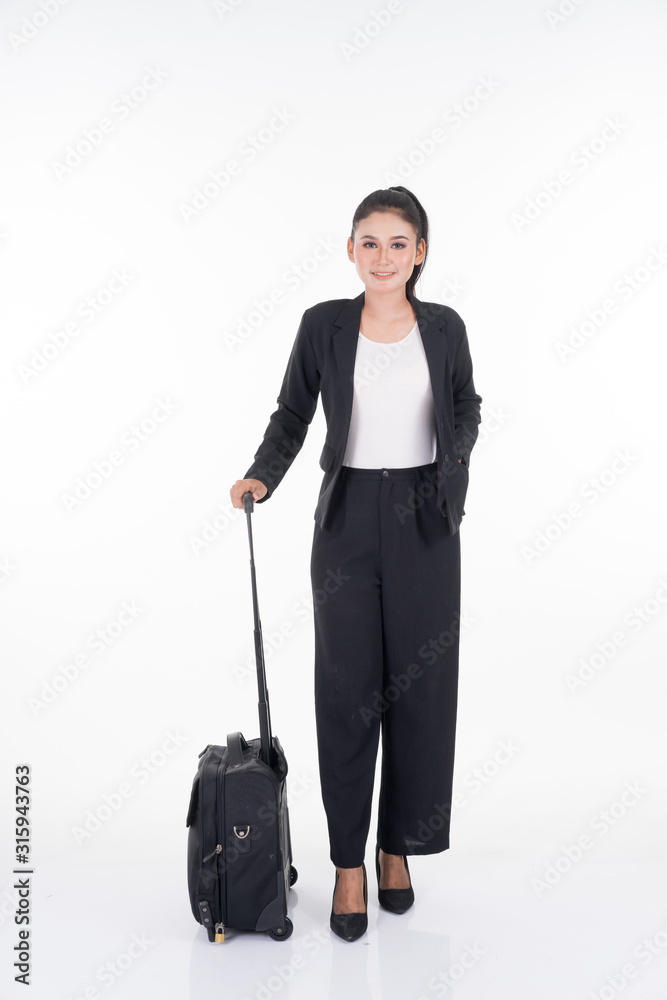 Businesswoman on a business trip, with luggage isolated on white background. Suitable for cut out, manipulation or composite works for travel or business concept. Businesswoman on a business trip, with luggage isolated on white background. Suitable for cut out, manipulation or composite works for travel or business concept.