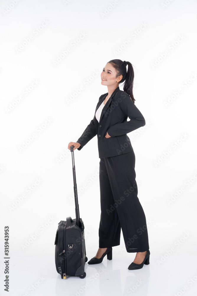 Businesswoman on a business trip, with luggage isolated on white background. Suitable for cut out, manipulation or composite works for travel or business concept. Businesswoman on a business trip, with luggage isolated on white background. Suitable for cut out, manipulation or composite works for travel or business concept.