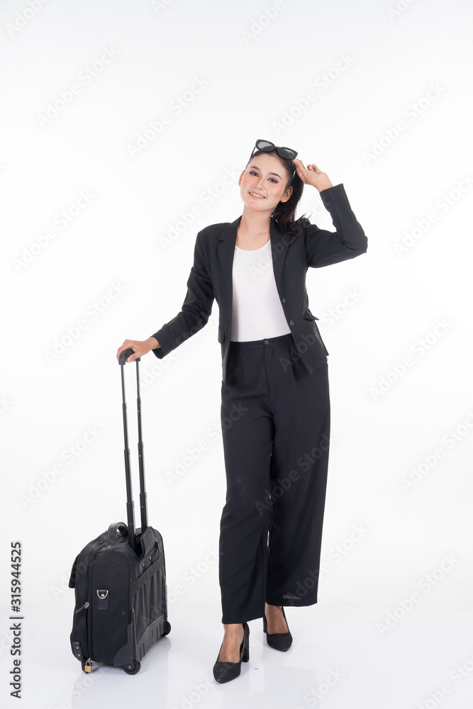 Businesswoman on a business trip, with luggage isolated on white background. Suitable for cut out, manipulation or composite works for travel or business concept. Businesswoman on a business trip, with luggage isolated on white background. Suitable for cut out, manipulation or composite works for travel or business concept.