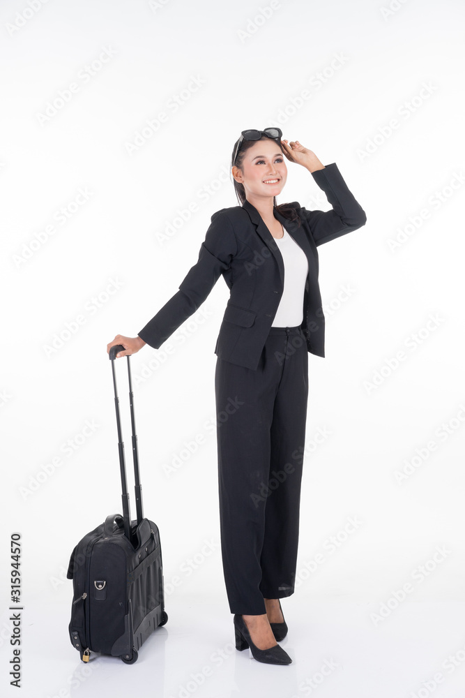 Businesswoman on a business trip, with luggage isolated on white background. Suitable for cut out, manipulation or composite works for travel or business concept. Businesswoman on a business trip, with luggage isolated on white background. Suitable for cut out, manipulation or composite works for travel or business concept.
