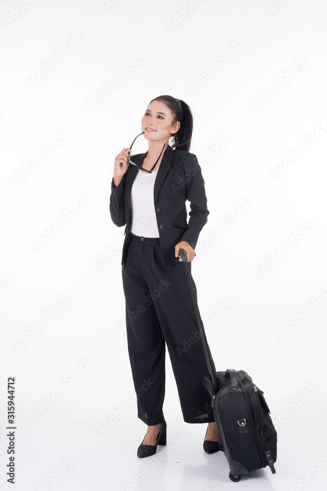 Businesswoman on a business trip, with luggage isolated on white background. Suitable for cut out, manipulation or composite works for travel or business concept. Businesswoman on a business trip, with luggage isolated on white background. Suitable for cut out, manipulation or composite works for travel or business concept.