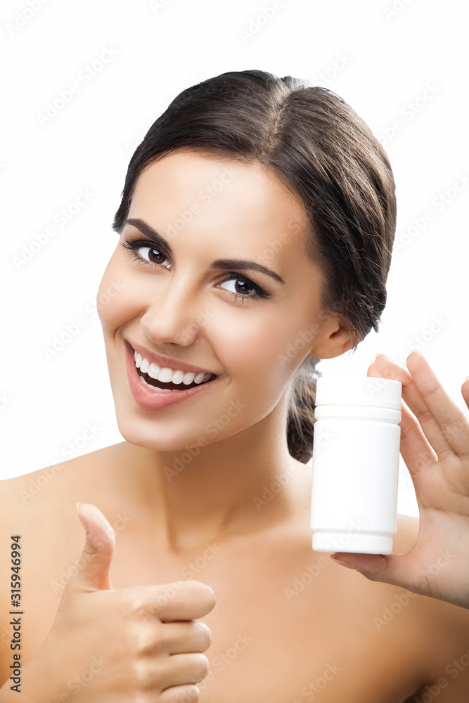 Happy smiling woman showing some medical drug, with empty blank copy space area for text, isolated over white background. Healthcare and medicine concept. Happy smiling woman showing some medical drug, with empty blank copy space area for text, isolated over white background. Healthcare and medicine concept.