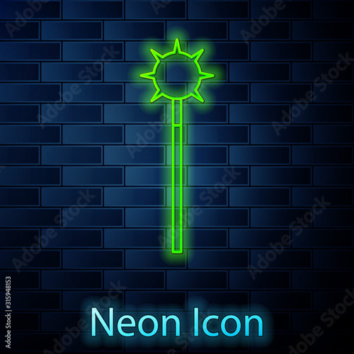 Glowing neon line Medieval chained mace ball icon isolated on brick wall background. Medieval weapon. Vector Illustration