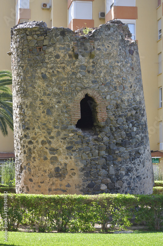 Ladeada tilted sentinel tower in Algarrobo Costa , Malaga, Spain photo