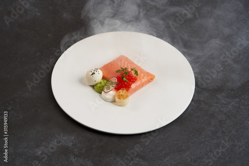 Salmon, trout with quail egg creamy mousse and green mayonnaise