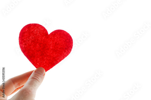 Happy Valentine's day. February 14. Red heart in hand.