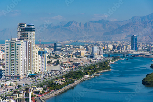 Aerial view of Ras al Khaimah, United Arab Emirates north of Dubai, looking at the city, , Jebal Jais - and along the Corniche. © KingmaPhotos