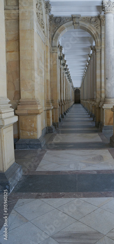 Down the mill colonnade in Karlovy Vary with pillars 