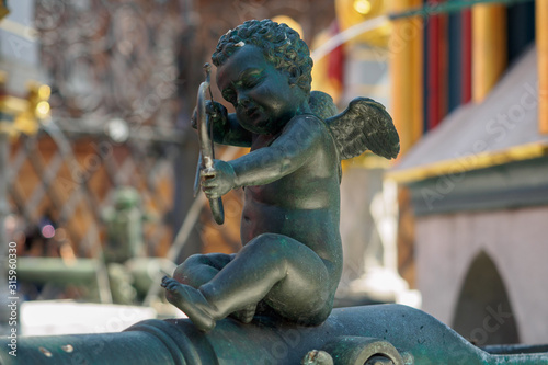Obraz na płótnie Detail of the Schoner Brunnen fountain and statue in market square of Nuremberg, Germany w salonie