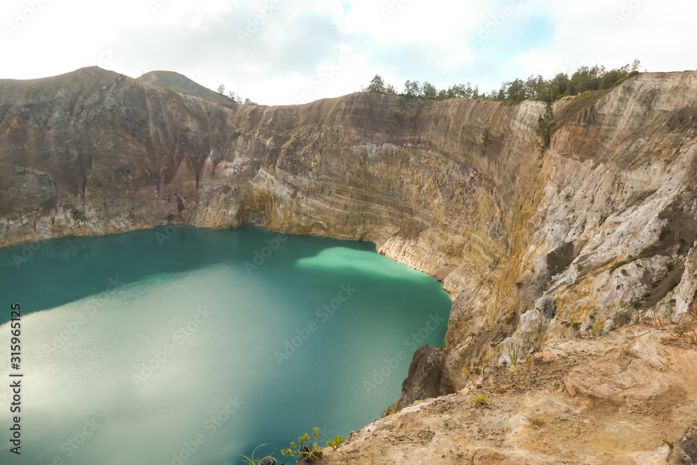Kelimutu - Close up on turquoise colored volcanic lake