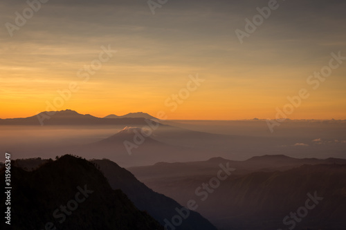 A beautiful scene of Mount Bromo at sunrise or sunset taken from best view point, Penanjakan. Mount Bromo is an active volcano and one of the most visited tourist attractions in East Java, Indonesia.