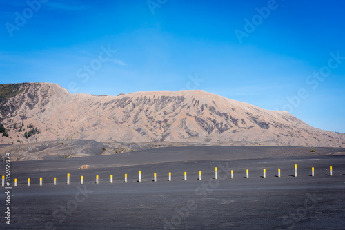 A field of black sand on Bromo. Mount Bromo is an active volcano and one of the most visited tourist attractions in East Java, Indonesia.