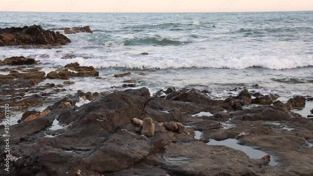 Water in the sea flowing between the rocks Water in the sea flowing between the rocks