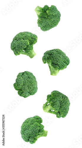 Falling broccoli isolated on a white background. Flying vegetables for packaging design.
