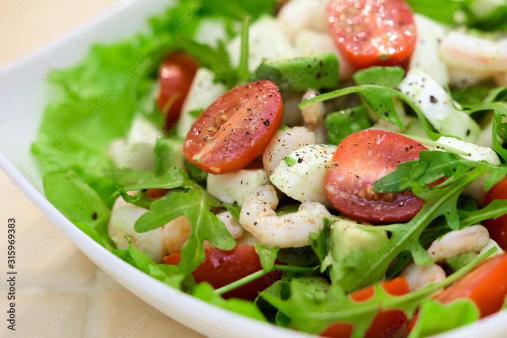 Bright vegetable salad with shrimp and cheese. Bright vegetable salad with shrimp and cheese.