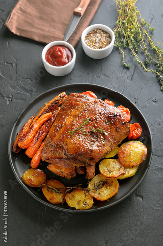 Barbecue pork, fried potatoes and carrots