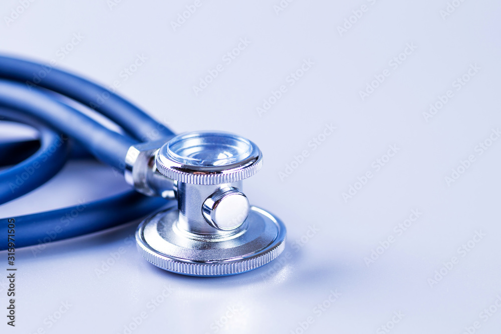 Medical concept image. Stethoscope on white background close up.A lot copy space around the product.Blue stethoscope.Healthcare. Medical concept image. Stethoscope on white background close up.A lot copy space around the product.Blue stethoscope.Healthcare.