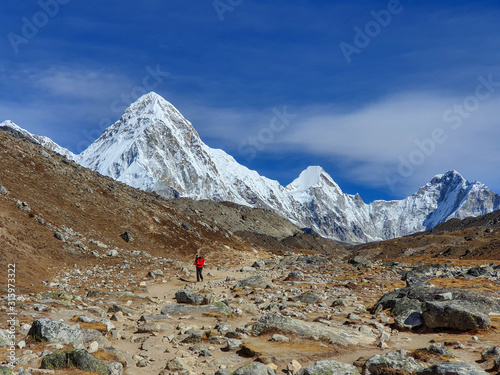 Beautiful view on Pumori mountain in the early sunny morning. Everest base camp trek: from Dzongla to Lobuche, Solokhumbu, Nepal.