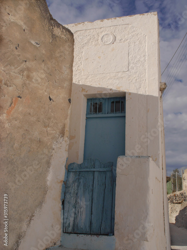 Fototapeta Naklejka Na Ścianę i Meble -  Emporio, the largest village of Santorini,Greece. Views of Typical buildings and streets of the central historical part.