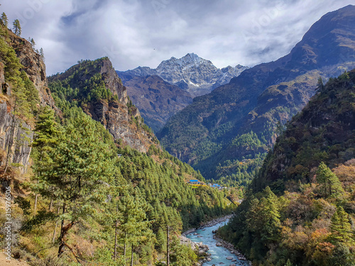 Picturesque view on Dudh Koshi river valley. Everest base camp trek: way down from Namche Bazar to Surke and Paiya. Himalayas, Solokhumbu, Nepal. photo