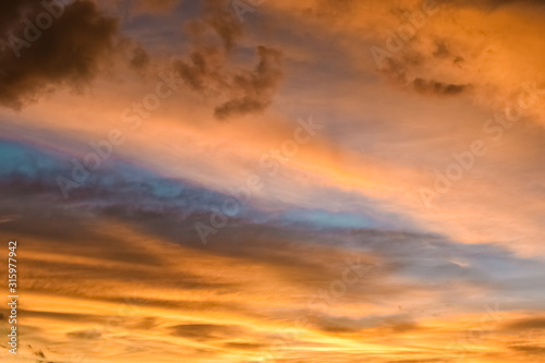 Beautiful golden, orange and blue hues of the sky at sunset