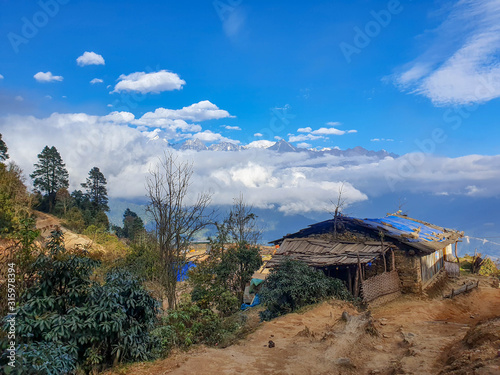 At the top of Taksindu La pass. Taksindu village. Everest base camp trek: way from Kharikhola to Taksindu. Himalayas, Solokhumbu, Nepal.