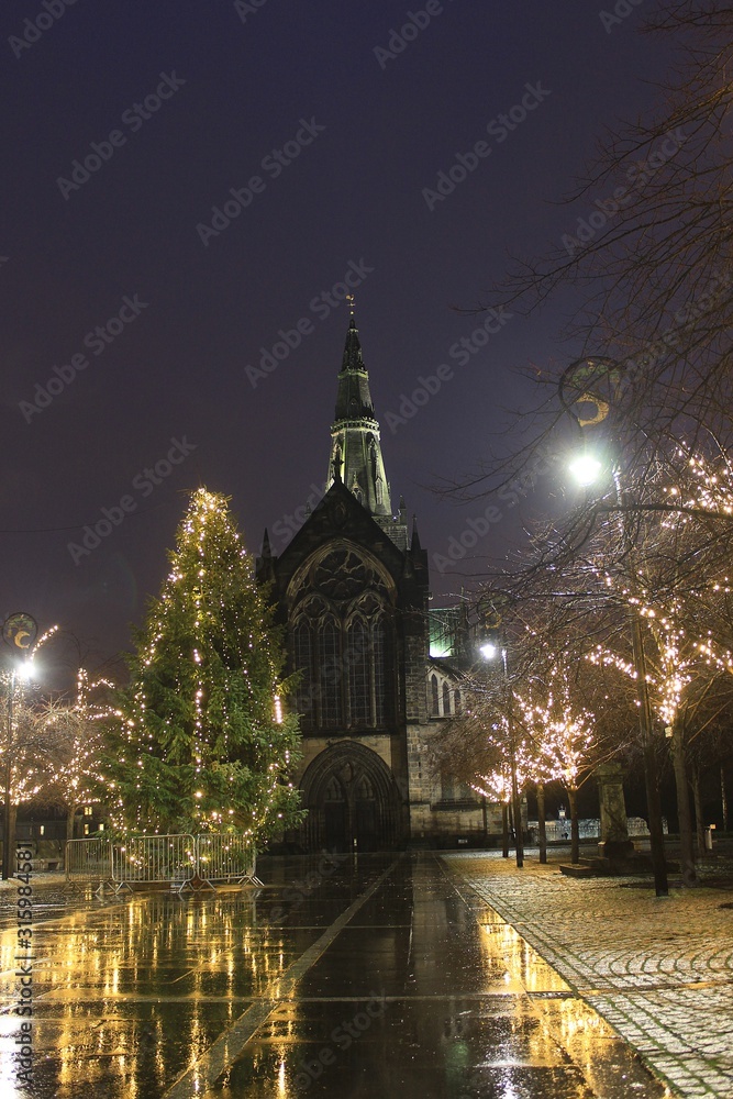 Glasgow Cathedral and Cathedral Square, Glasgow, by night during Christmastime.