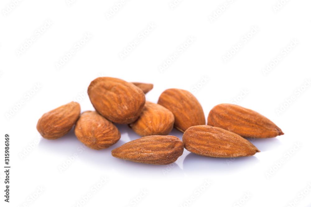 Group of almonds isolated on white background Group of almonds isolated on white background
