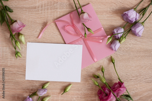 bouquet of roses and blank card