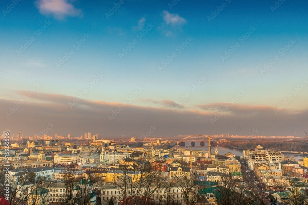 View from mountain of Dnieper river and the old city Kiev at sunset