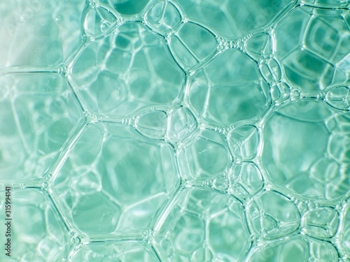Macro close up of soap bubbles look like scienctific image of cell and cell membrane. tiffany background