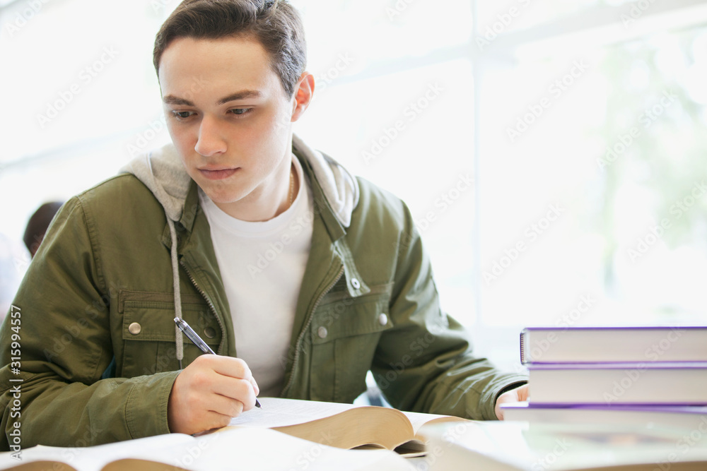 Student writing paper