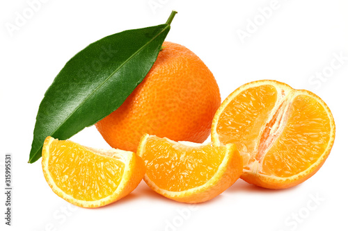 mandarin with slices and green leaf isolated on white background