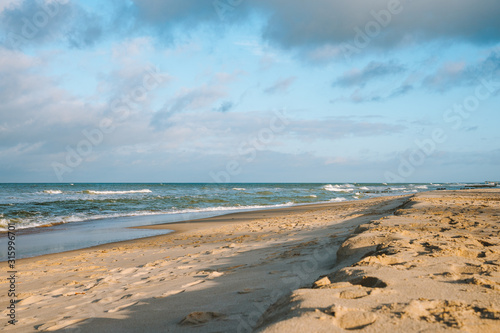 Fototapeta Naklejka Na Ścianę i Meble -  Baltic sea coast beach at sunset