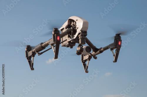 Fototapeta Naklejka Na Ścianę i Meble -  Drone quadcopter with digital camera