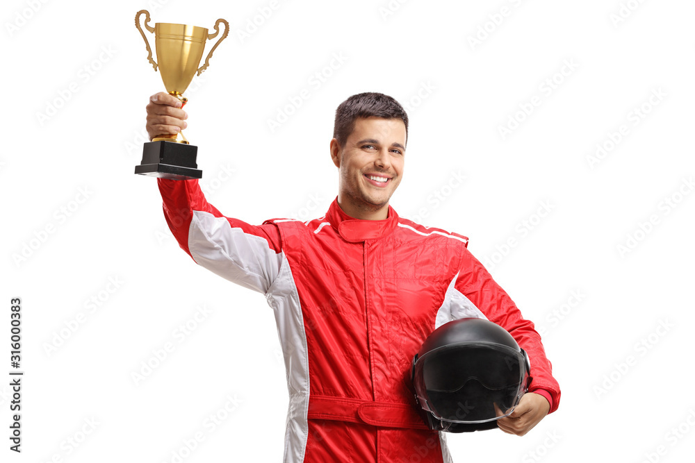 Φωτογραφία Young male car racer standing and holding a helmet and a gold trophy cup
