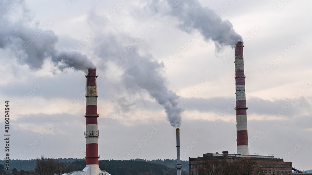 Smoking chimney of the gas boiler plant in Vilnus. Ecological problem.
