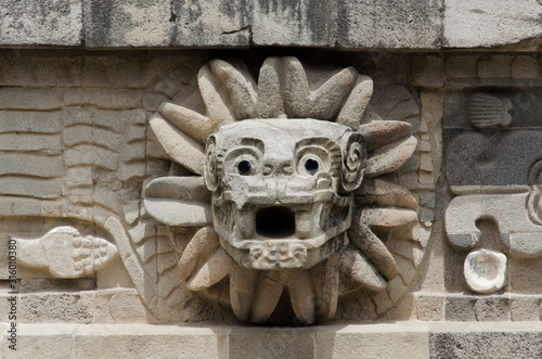 Feathered Serpent stone head in the Temple of Quetzalcoatl in Teotihuacan, Mexico photo