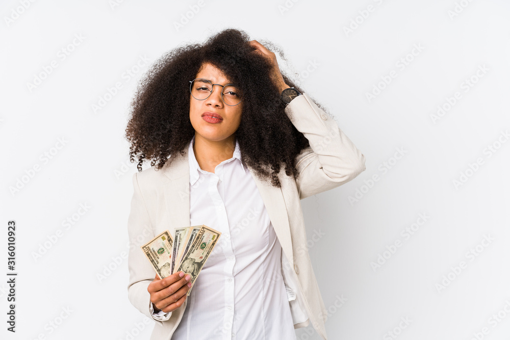 Young afro business woman holding a credit car isolated Young afro business woman holding a credit carbeing shocked, she has remembered important meeting. Young afro business woman holding a credit car isolated Young afro business woman holding a credit carbeing shocked, she has remembered important meeting.