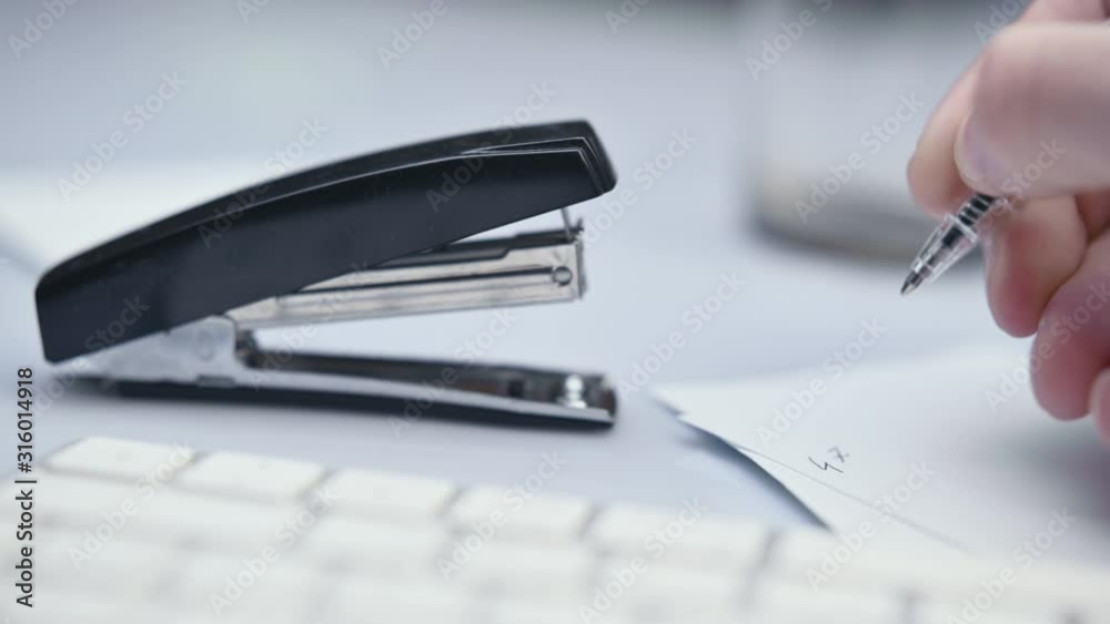 Using Stapler, Stapling Paper, Struggling with Office Supply, Close Up Shot Using Stapler, Stapling Paper, Struggling with Office Supply, Close Up Shot