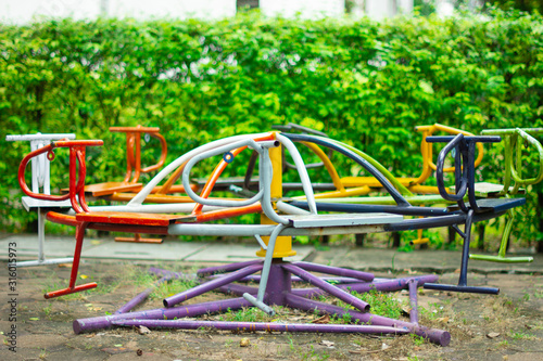 Colorful children's merry-go-round in the playground.
