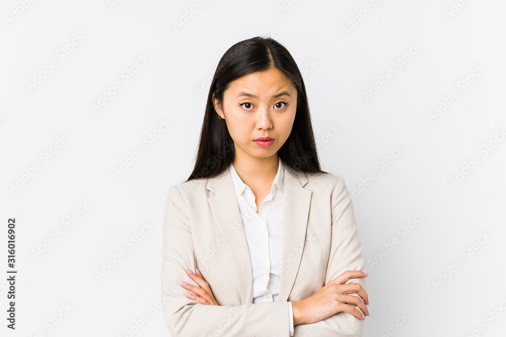 Young chinese business woman isolated unhappy looking in camera with sarcastic expression. Young chinese business woman isolated unhappy looking in camera with sarcastic expression.