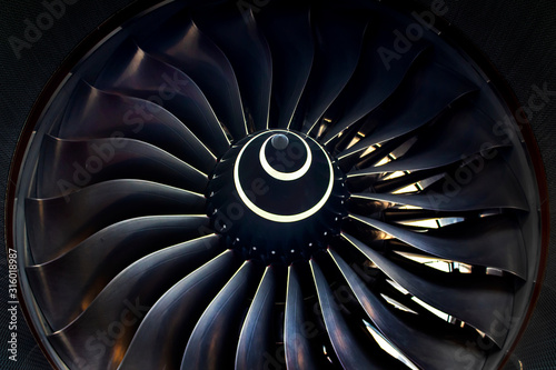 Turbofan Blades Closeup On A Large Commercial Jet Engine Airplane photo
