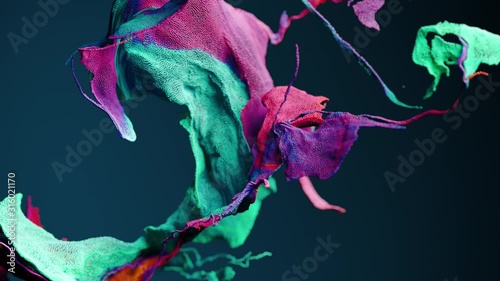 Abstract colorful particles fluid motion. Cg animation. Slow motion. Shallow depth of field.