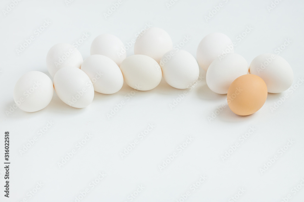 Group of white eggs on white background. Getting ready for the Easter holiday. Group of white eggs on white background. Getting ready for the Easter holiday.