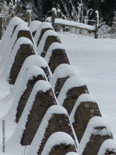 Westwall in der Eifel im Schnee / Hochformat photo